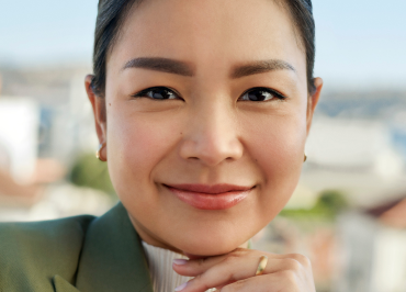 Young woman smiles without fine lines